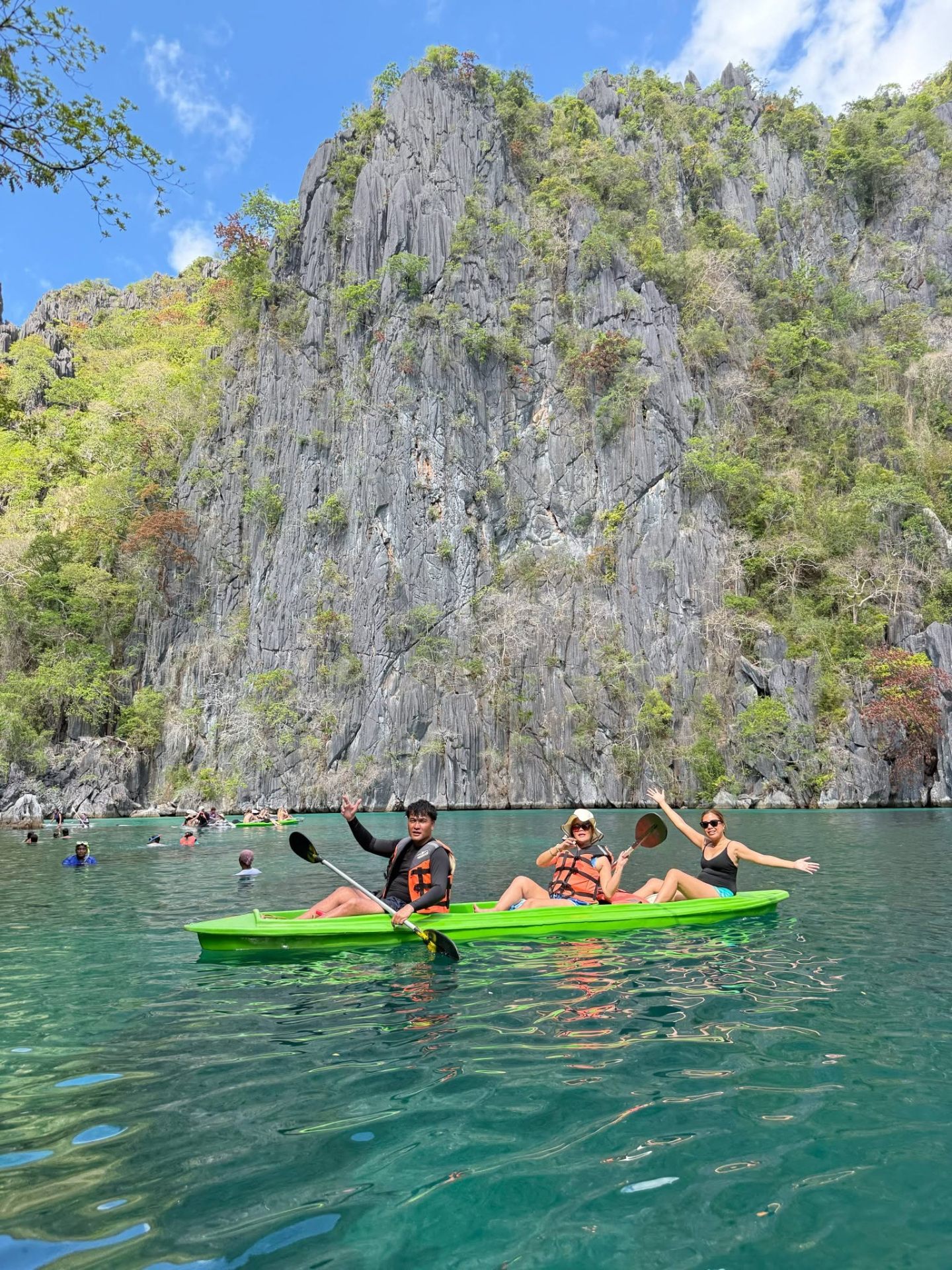 Paddling beneath Coron's limestone cliffs